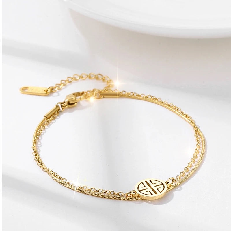 Two-layer disc bracelet